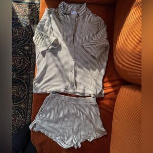 Striped Women's SABO skirt shorts and shirt set.